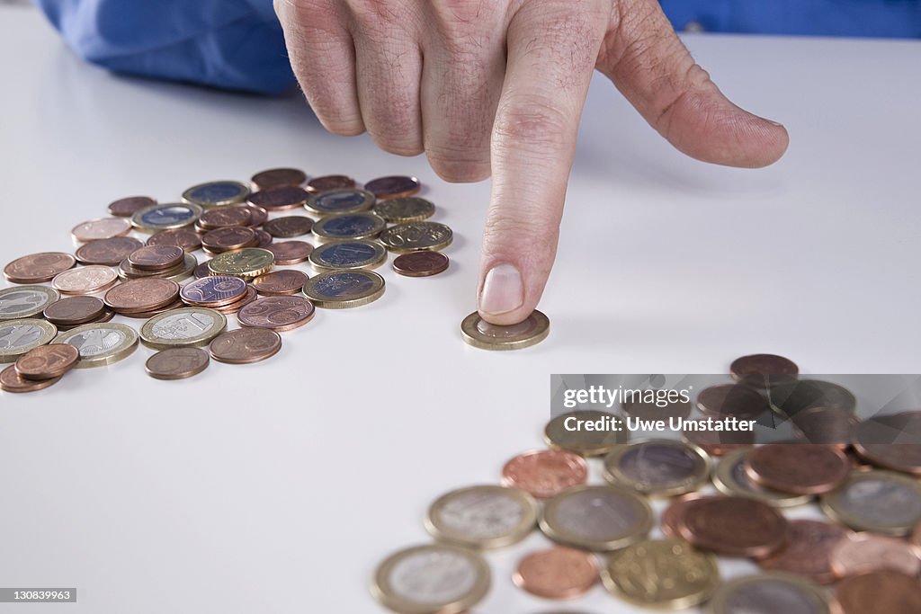 Hand Sortation Hand Sorting Coins High-Res Stock Photo - Getty Images