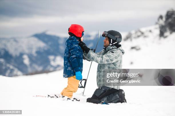 getting ready to ski - kid skiing stock pictures, royalty-free photos & images