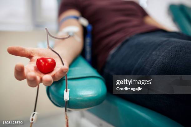 donating blood - blood bag imagens e fotografias de stock