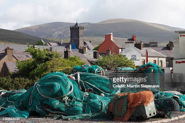 dingle, fishing nets and town, county kerry, ireland, british isles, europe - dingle ireland stock pictures, royalty-free photos & images