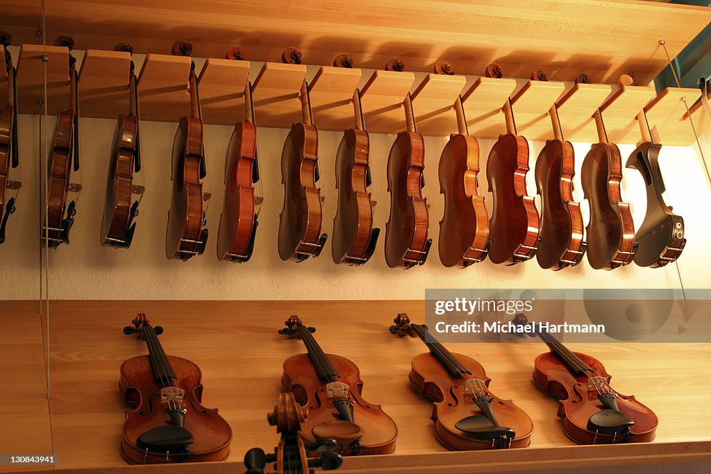 String Instruments In Shop String Instruments On Display At A Violin Makers Shop High-Res Stock ...