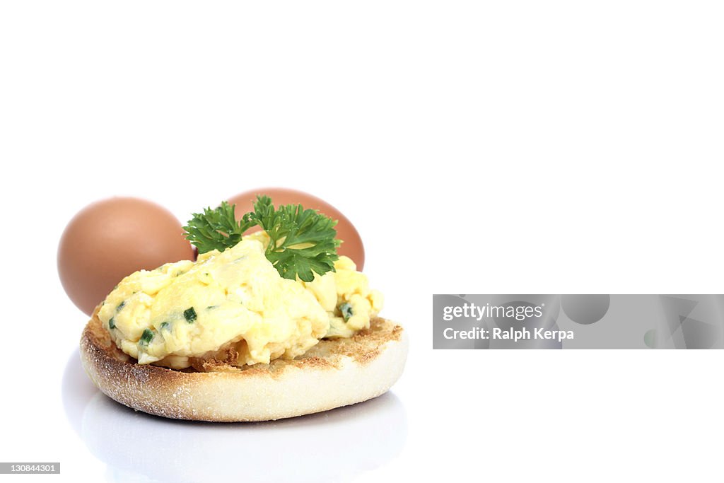 English muffin with scrambled eggs