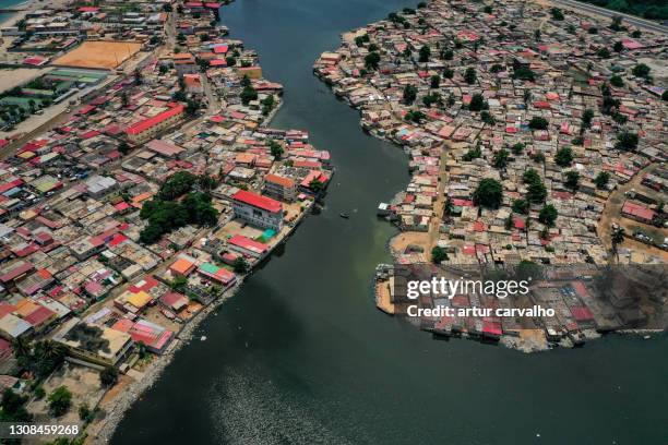 aerials from luanda capital of angola - slum africa stock pictures, royalty-free photos & images