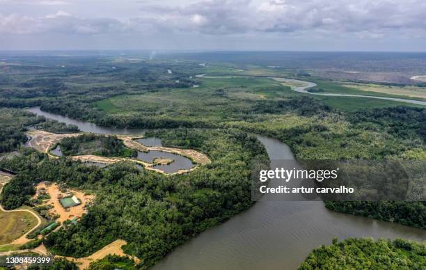 wide panorama from the river kwanza of angola in africa - angola water stock pictures, royalty-free photos & images