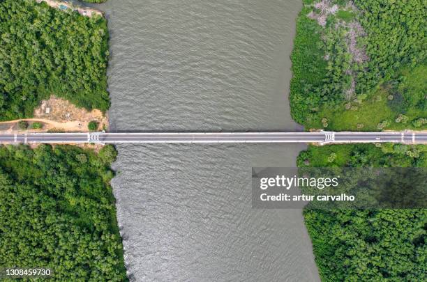 bridge over the cuanza river (kwanza) aerial view - angola drone stock pictures, royalty-free photos & images