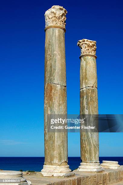 columns with corinthian capital in roman theatre near the mediterranean sea leptis magna libya - theater of leptis magna stock pictures, royalty-free photos & images