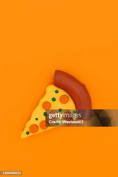 three dimensional render of single pizza slice - food orange background stock illustrations