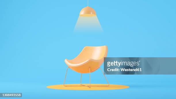 three dimensional render of light fixture glowing over empty armchair - haus und extravagant stock-grafiken, -clipart, -cartoons und -symbole