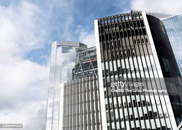 directly below shot of modern skyscrapers in the city of london - hedge fund stock pictures, royalty-free photos & images