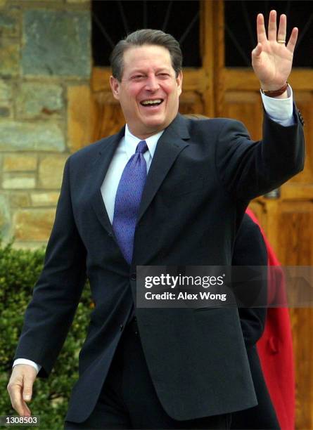 Democratic Presidential Candidate Vice President Al Gore waves as he leaves Mt. Vernon Baptist Church December 2, 2000 in Arlington, Va. Al Gore''s...