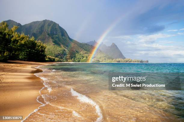 rainbow hawaii beach - hanalei stock pictures, royalty-free photos & images