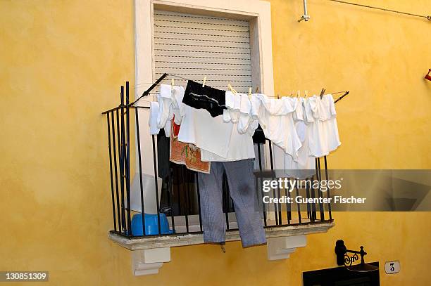 drying laundry italy - humid stock pictures, royalty-free photos & images