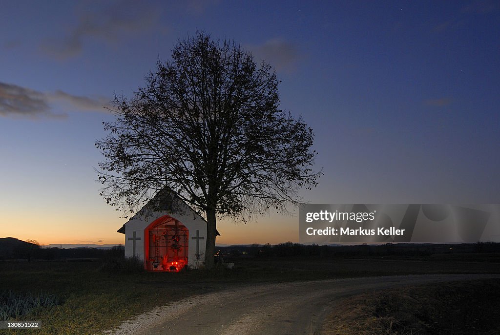A illuminated chapel in the sunset light - Baden Wuerttemberg, Germany, Europe.