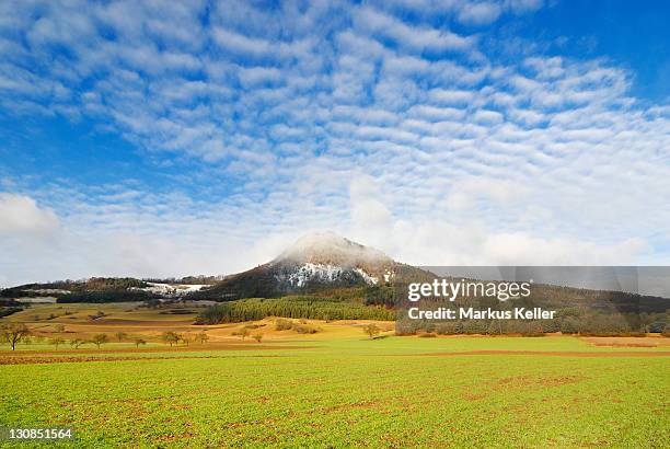 the hohenhewen in the hegau area - baden-wuerttemberg, germany, europe. - altocúmulo fotografías e imágenes de stock