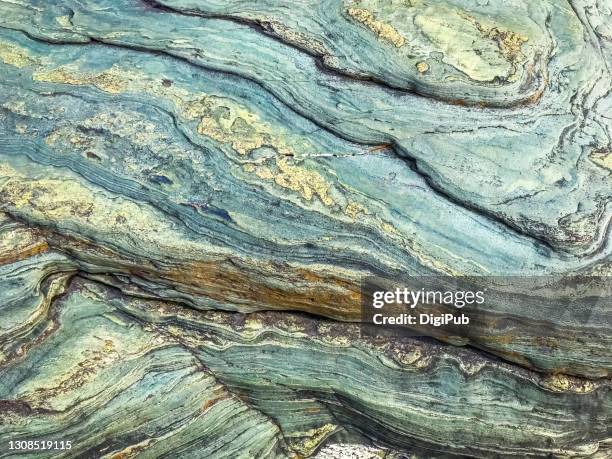 green rock texture - geology layers stock pictures, royalty-free photos & images