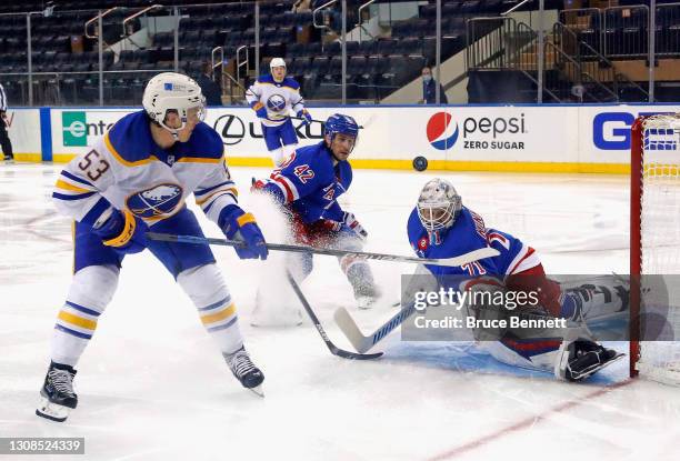 Keith Kinkaid of the New York Rangers makes the second period save on Jeff Skinner of the Buffalo Sabres at Madison Square Garden on March 22, 2021...
