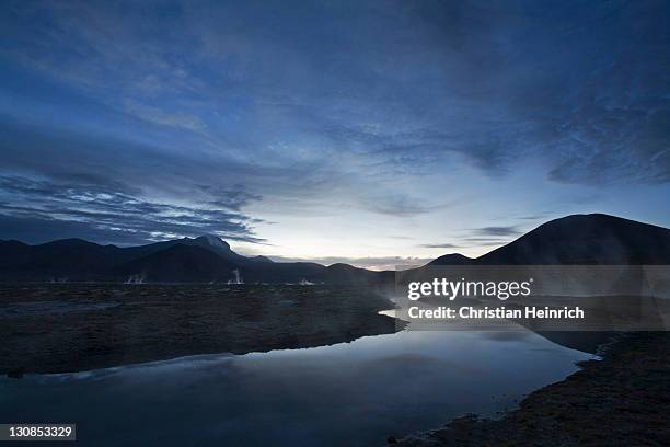 natural thermal springs polloquere at dawn, salt lake salar de surire, national park reserva nacional las vicunas, chile, south america - southernly stock pictures, royalty-free photos & images