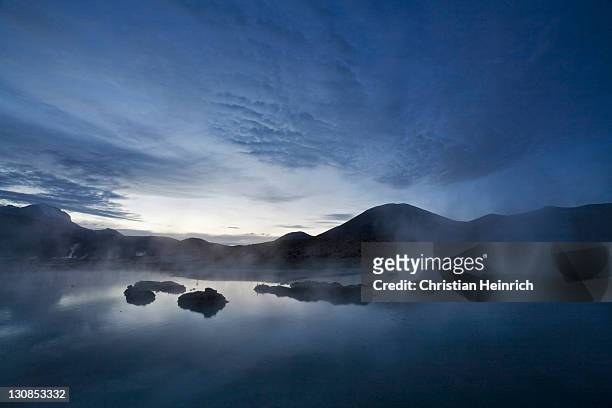 natural thermal springs polloquere at dawn, salt lake salar de surire, national park reserva nacional las vicunas, chile, south america - southernly stock pictures, royalty-free photos & images