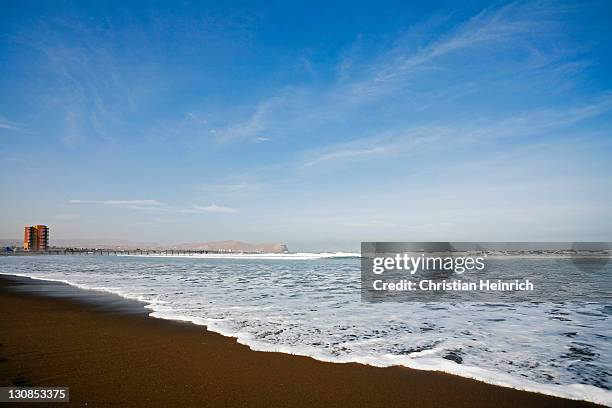 beach with skyline from arica, chile, south america - southernly stock pictures, royalty-free photos & images