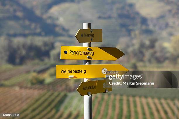 signpost, hiking trails, panoramaweg, german for panoramic path and welterbesteig trail, rossatz, wachau valley, mostviertel region, lower austria, austria, europe - rossatz stock pictures, royalty-free photos & images