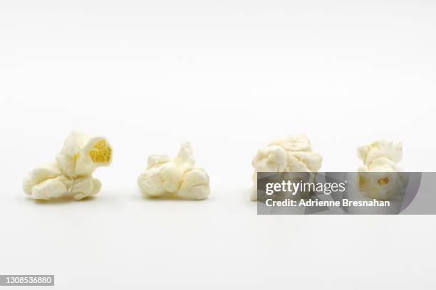 four pieces of popcorn - popcorn bildbanksfoton och bilder