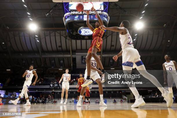 Evan Mobley of the USC Trojans dunks the ball against the Kansas Jayhawks in the first half of their second round game of the 2021 NCAA Men's...