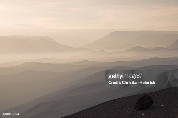morning vibe with fog at the andes, north from chile, south america - southernly stock pictures, royalty-free photos & images