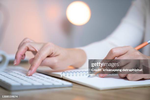 business woman working on the computer,accounting - libro mastro foto e immagini stock