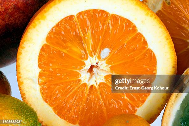 cut open orange - zitrusfrucht stock pictures, royalty-free photos & images