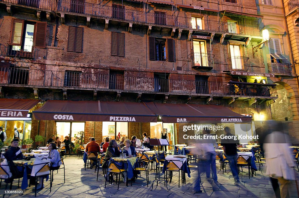 Restaurant at night in Siena, Tuscany, Italy|