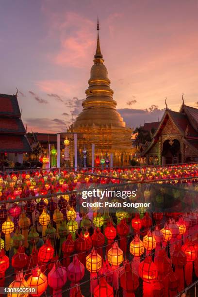 colorful lamp festival and lantern in loi krathong at wat phra that hariphunchai - lantern festival celebrates buddhas birthday ストックフォトと画像