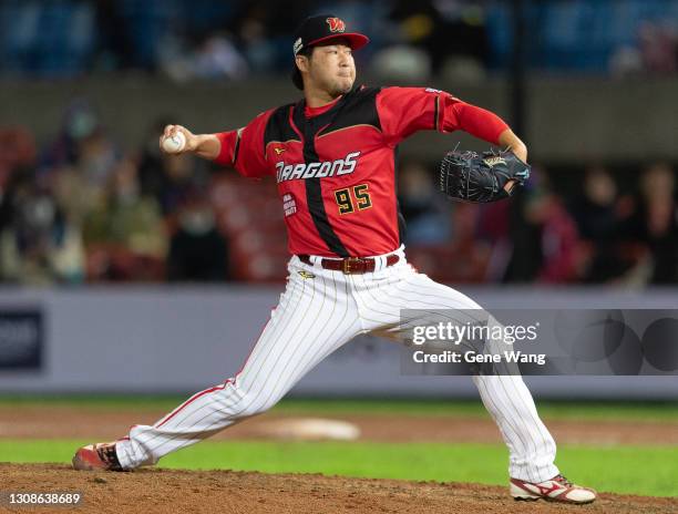 Pitcher Junichi Tazawa of Wei Chuan Dragons pitches at the bottom of the 9th inning during the CPBL game between Wei Chuan Dragons and Rakuten...