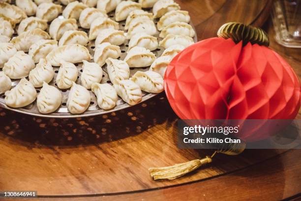 raw chinese dumplings (jiaozi) - dumpling stock pictures, royalty-free photos & images