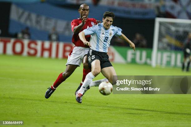 Javier Zanetti of Argentina and Trevor Sinclair of England in action during the World Cup 1st round match between Argentina and England at the...