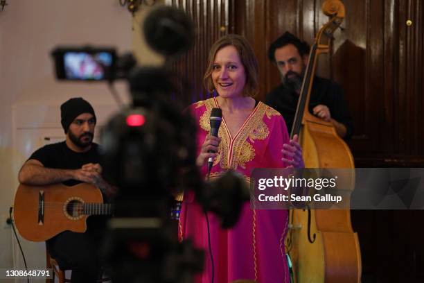 Nina Peretz, board member of the Fraenkelufer Synagogue Jewish community, speaks a welcome note during the recording of a concert by the Berlin-based...