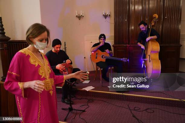 Nina Peretz, board member of the Fraenkelufer Synagogue Jewish community, as members of the Berlin-based Sistanagila band of Israeli and Iranian...