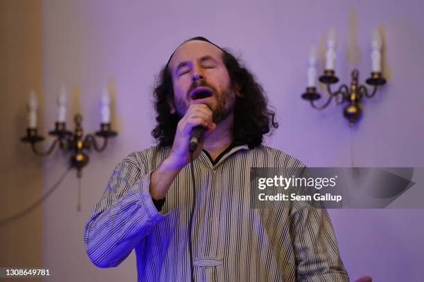 Singer Yuval Halpern and other members of the Berlin-based Sistanagila band of Israeli and Iranian musicians record a concert ahead of Passover at...