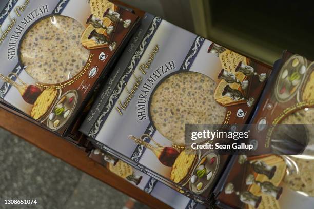 Packages of matzah, unleavened bread that is part of Jewish Passover tradition, lie on a bench at the Fraenkelufer Synagogue prior to Passover during...