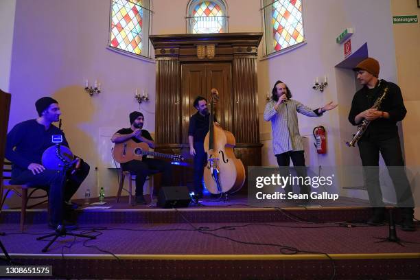 Members of the Berlin-based Sistanagila band of Israeli and Iranian musicians record a concert ahead of Passover at the Fraenkelufer Synagogue during...