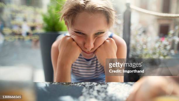 naughty little boy doesn't want to eat soup - picky eater stock pictures, royalty-free photos & images