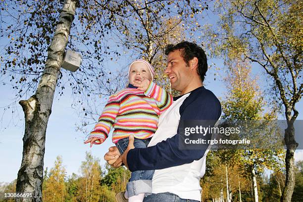father and his three-year-old daughter - 2 year old blonde girl father ストックフォトと画像
