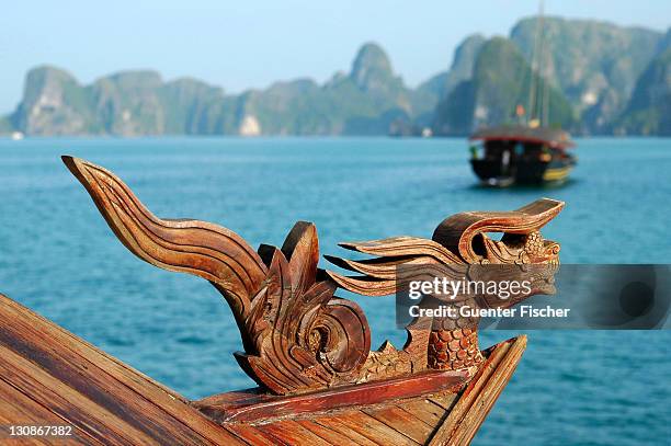 a figurehead of a traditional vietnamese junk boat at halong bay viet nam - figurehead stock pictures, royalty-free photos & images