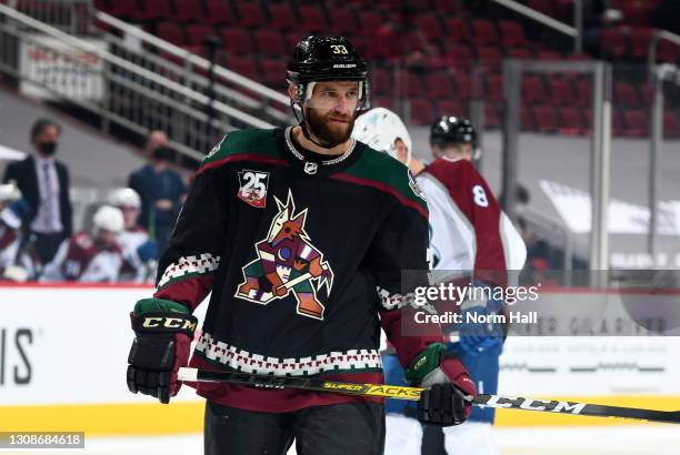 Alex Goligoski of the Arizona Coyotes prepares for the start of a game against the Colorado Avalanche at Gila River Arena on March 22, 2021 in...