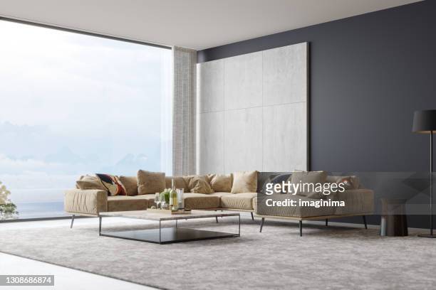 modernes luxus-wohnzimmer-interieur mit schönem meerblick - simple living stock-fotos und bilder