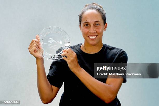 Madison Keys poses with her 2020 WTA Peachy Kellmeyer Player Service award during the Miami Open at Hard Rock Stadium on March 23, 2021 in Miami...
