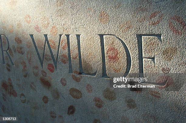 The grave site of writer Oscar Wilde in Pere Lachaise cemetery October 11, 2000 in Paris, France.