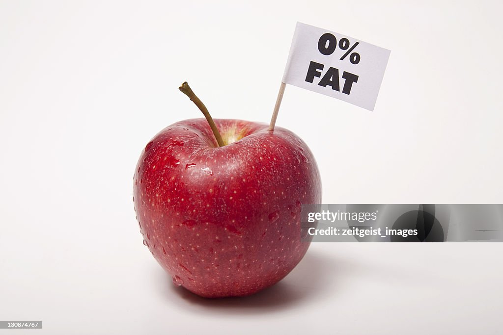 Red apple, flag with the inscription 0% fat