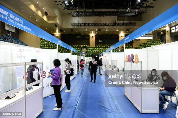 Job seekers look for job opportunities during the Greater Bay Area Youth Employment Scheme Job Expo held by HKSAR Labour Department at MacPherson...