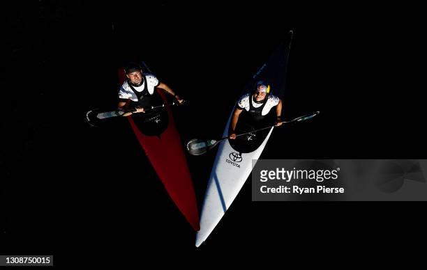 Australian Olympic Slalom Canoe Team members Jessica Fox and Lucien Delfour pose at Penrith Whitewater Centre on March 24, 2021 in Sydney, Australia....
