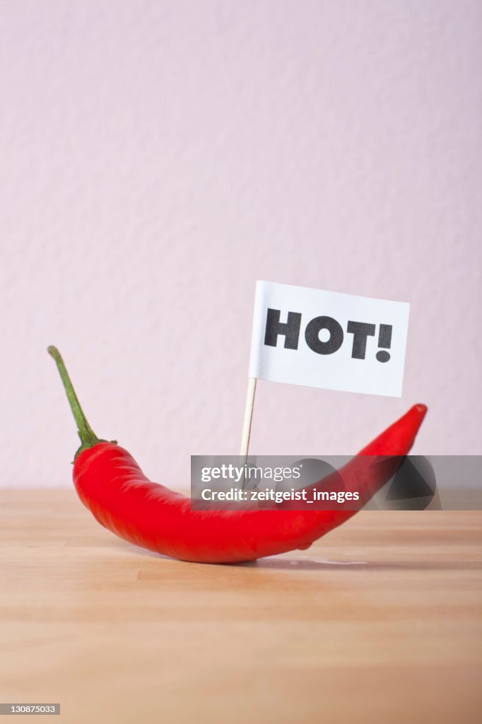 Chilli pepper, flag saying hot!